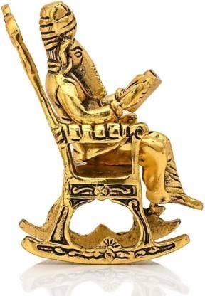 Handcrafted Golden Ganesha Figurine – Rocking Chair with Ramayan