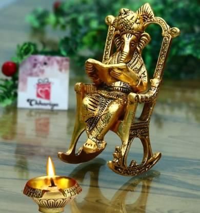 Handcrafted Golden Ganesha Figurine – Rocking Chair with Ramayan