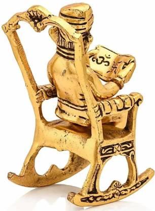 Handcrafted Golden Ganesha Figurine – Rocking Chair with Ramayan