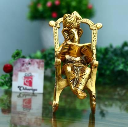 Handcrafted Golden Ganesha Figurine – Rocking Chair with Ramayan